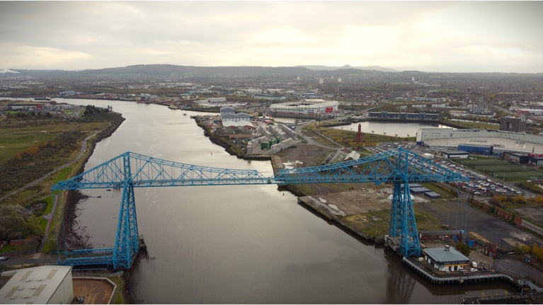 Transporter Bridge over the River Tees with Roseberry Topping in the far distance